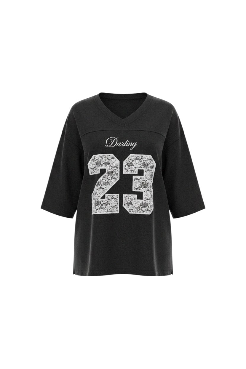 Hush Boutique black heavy cotton jersey t-shirt with white lace "Darling 23" graphic and v-neck.