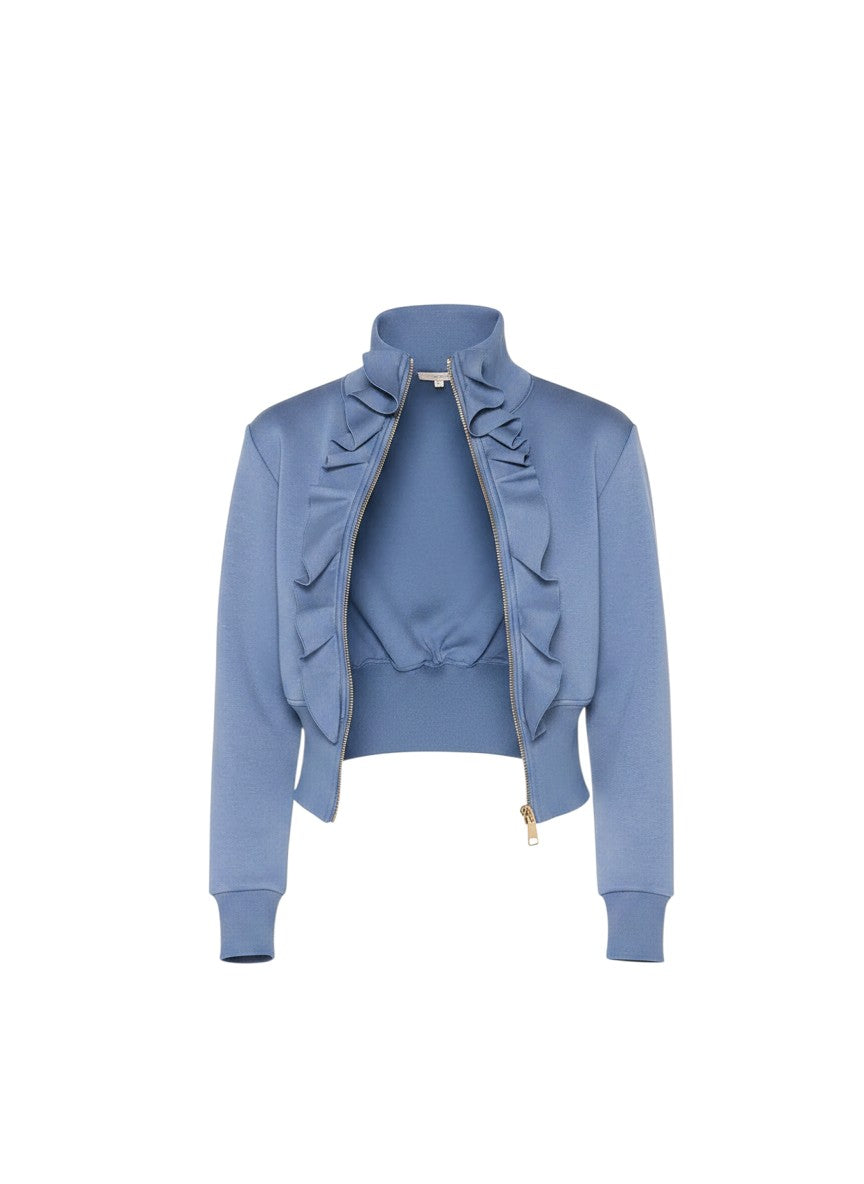 Hush Boutique blue scuba jacket with high neck, asymmetrical ruffle detail, and gold zipper. Made of polyester, cotton, and spandex blend.