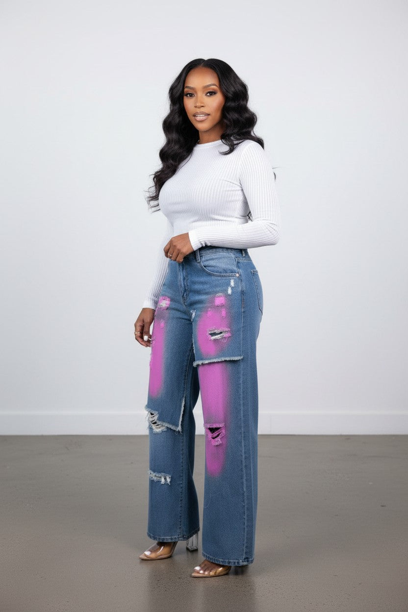 Hush Boutique Camellia Painted Double Waisted Jeans with distressed details and pink spray paint accents.
