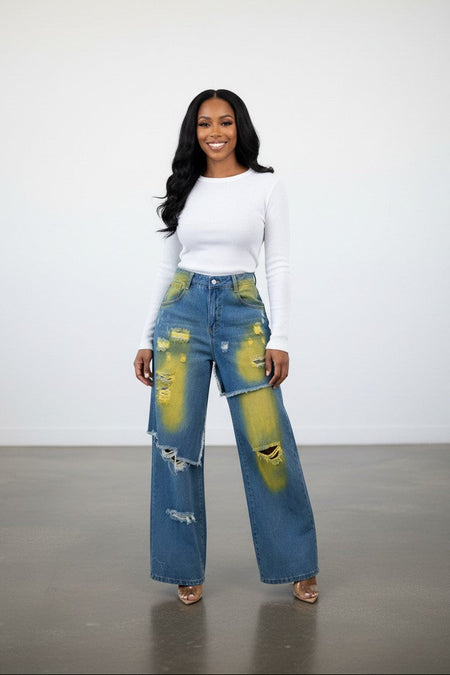 Hush Boutique Camellia Painted Double Waisted Jeans with distressed details and yellow spray paint accents.
