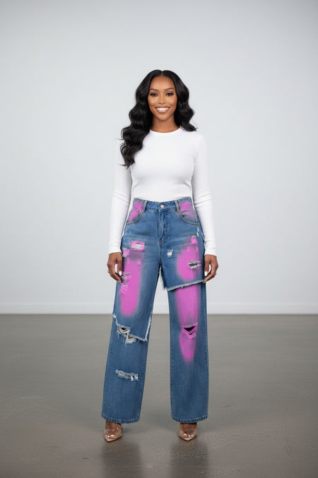 Hush Boutique Camellia Painted Double Waisted Jeans with distressed details and pink spray paint accents.