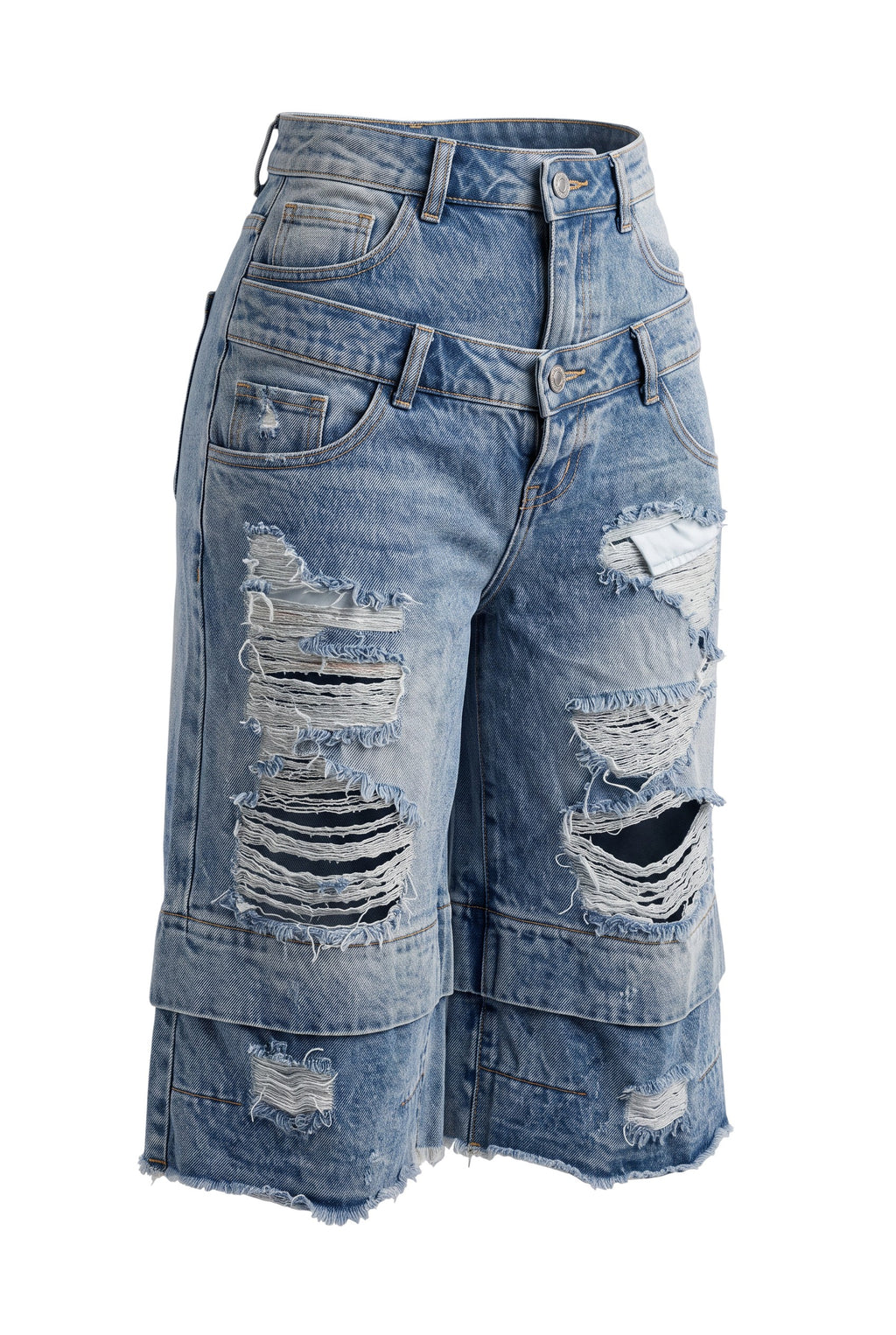 Hush Boutique vintage blue denim jorts featuring a double-waisted design and heavy distressing with raw hems.