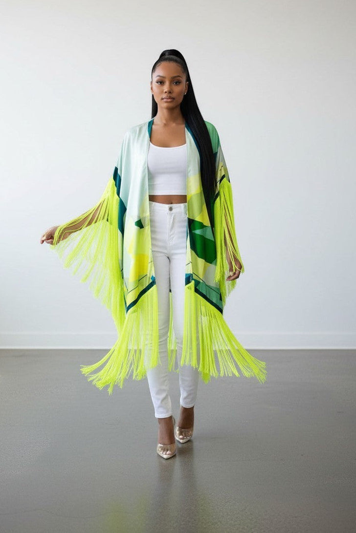 Hush Boutique Vacay in Capri open front kimono with green and yellow geometric print and long neon fringe trim