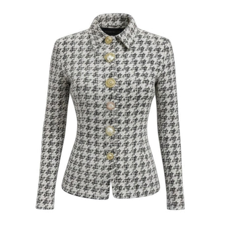 Hush Boutique black and white houndstooth tweed shirt jacket with charm buttons and a fitted waist.