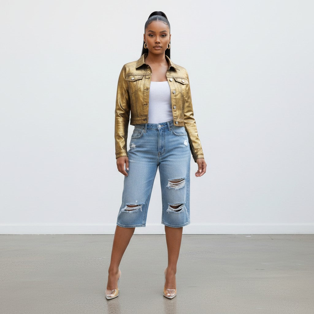 Hush Boutique metallic gold waxed denim cropped jacket with button front closure worn by a model.