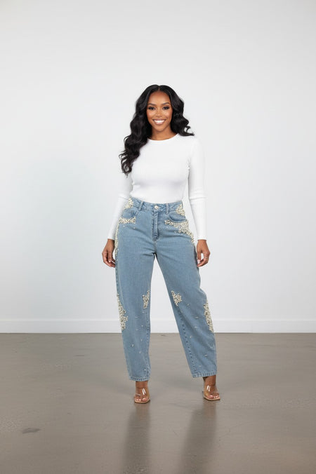 Hush Boutique light blue denim barrel jeans adorned with pearl and bead embellishments on hips and legs.
