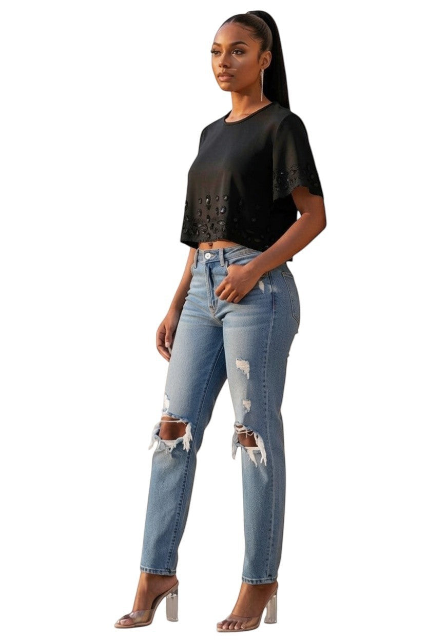 Hush Boutique light pink crop shirt with peach rhinestone embellishments on the hem and sleeves.