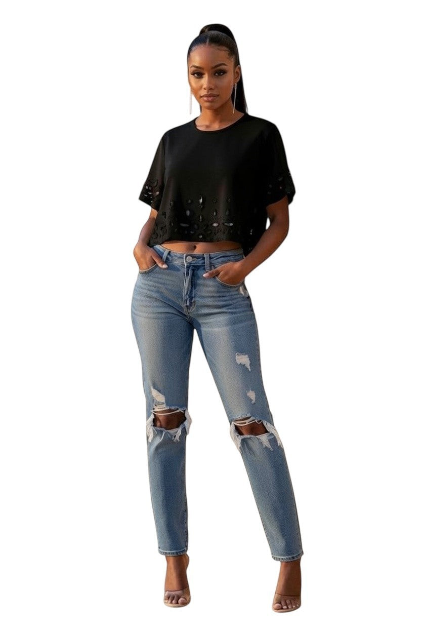 Hush Boutique light pink crop shirt with short sleeves and rhinestone embellishments on the hem and sleeves.