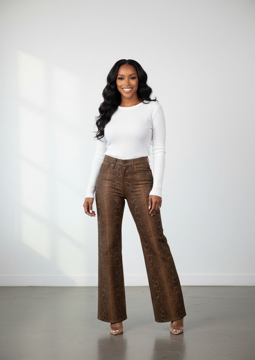 Hush Boutique brown snakeskin faux leather wide-leg jeans with invisible pockets. 98% Cotton, 2% Spandex.