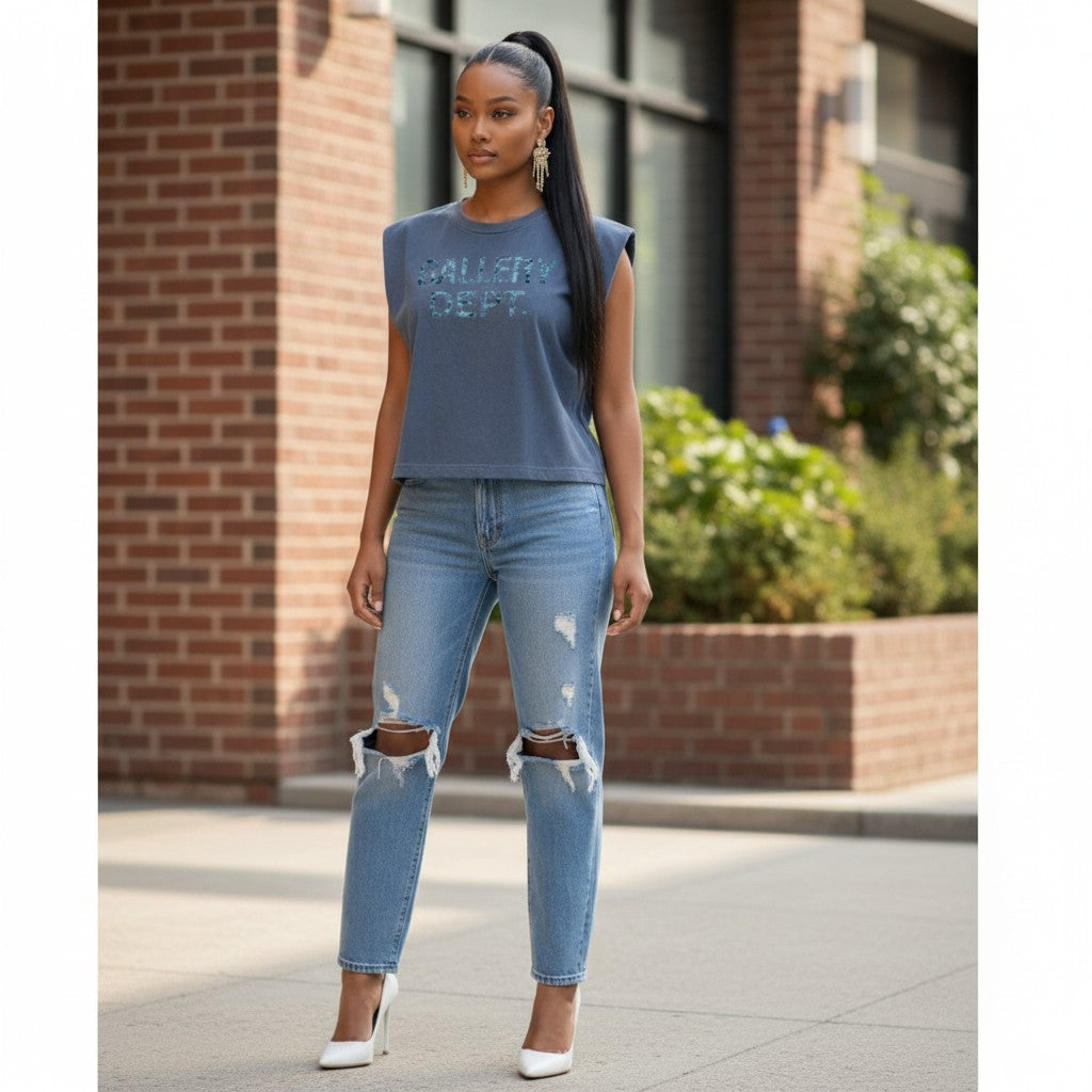 Hush Boutique vintage washed blue 100% cotton muscle tee with 'GALLERY DEPT.' graphic print.