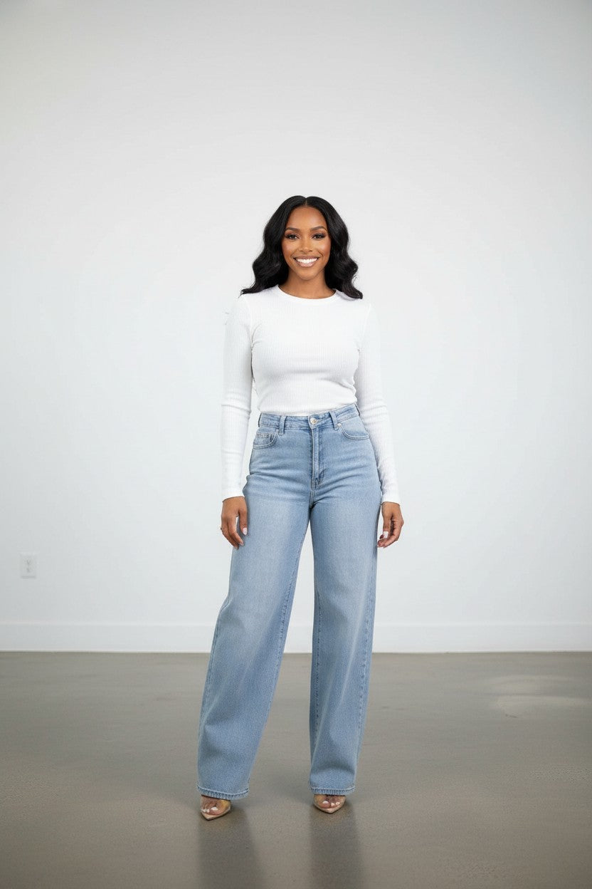 Hush Boutique light wash high waist stretchy wide leg denim jeans made of cotton, polyester, and spandex.